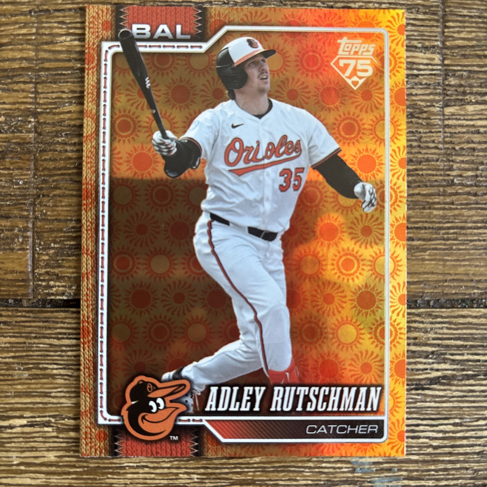 2026 Topps Series 2 Orange “SUN” Holo Foil Parallel #358 Adley Rutschman, Baltim