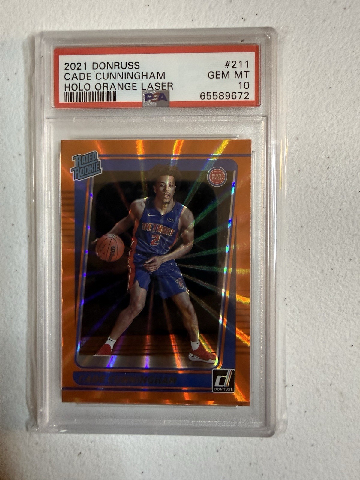 2021-22 Panini Donruss – Rated Rookie Cade Cunningham #211 Holo Orange Laser RC