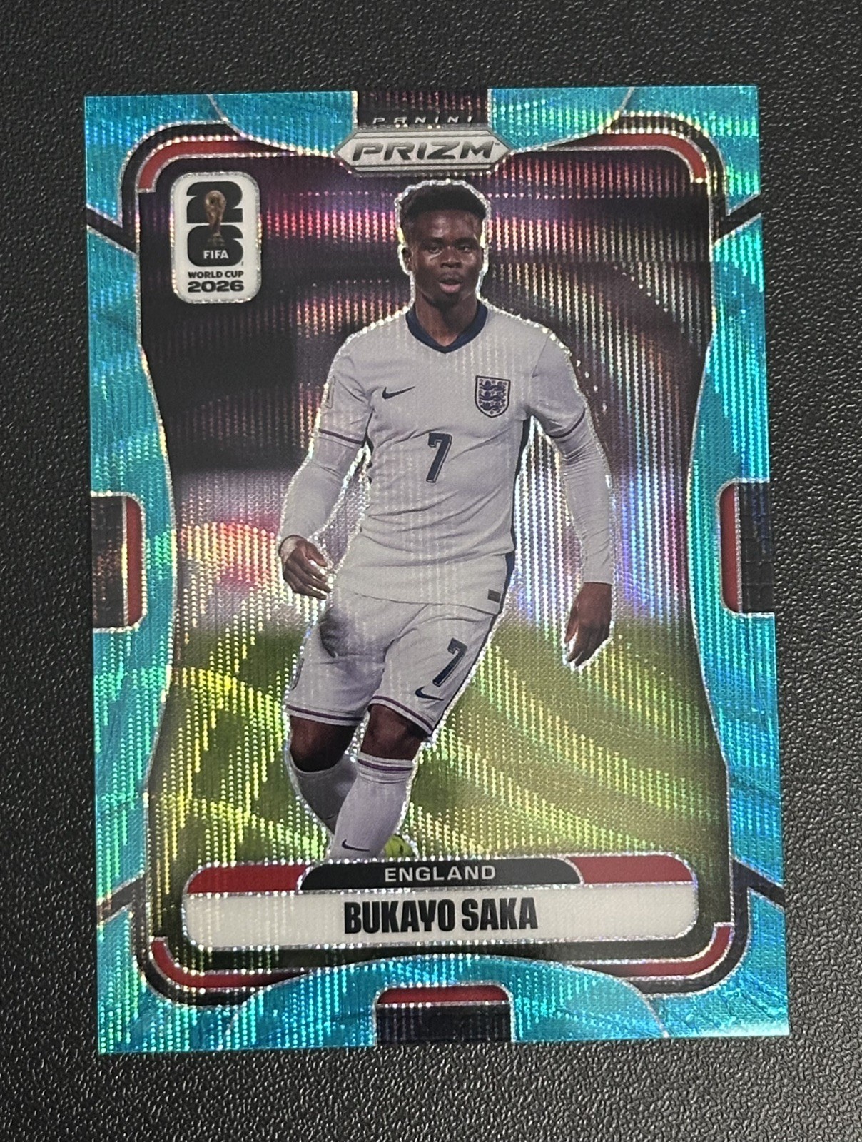 2026 Panini Prizm FIFA World Cup Bukayo Saka Teal Wave Prizm /99