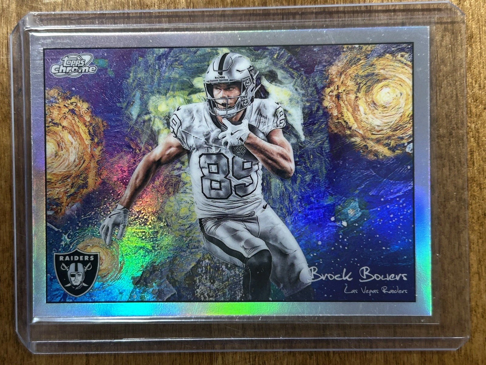 2025 Topps Cosmic Chrome – Brock Bowers #STN-21 Stars In The Night Raiders SP