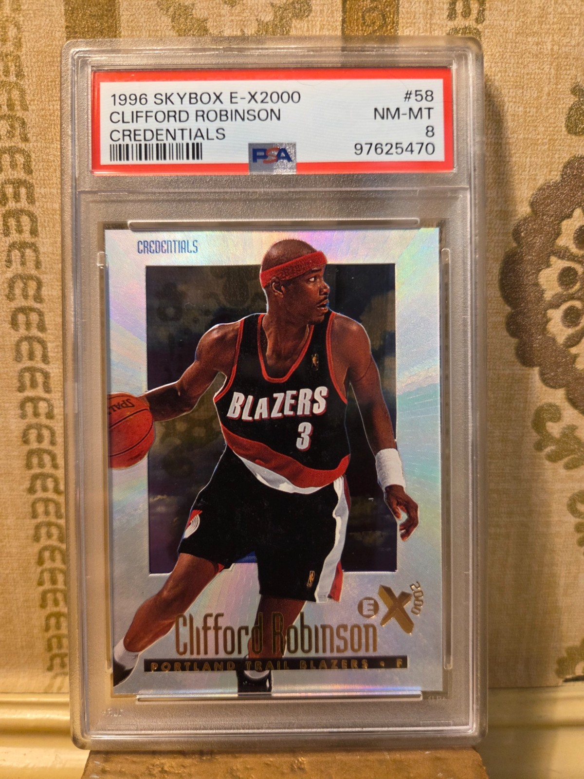1996 Skybox E-X2000 Credentials Clifford Robinson /499 PSA 8
