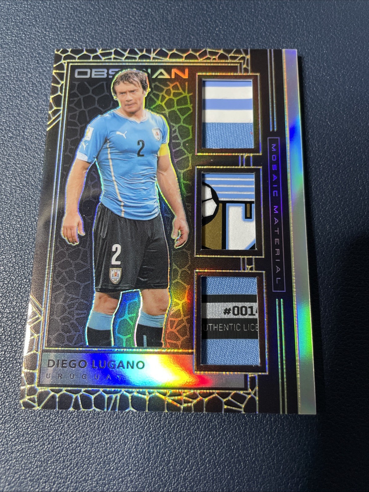 2019-20 Panini Obsidian Mosaic Material Electric Diego Lugano 7/10 Gold Uruguay