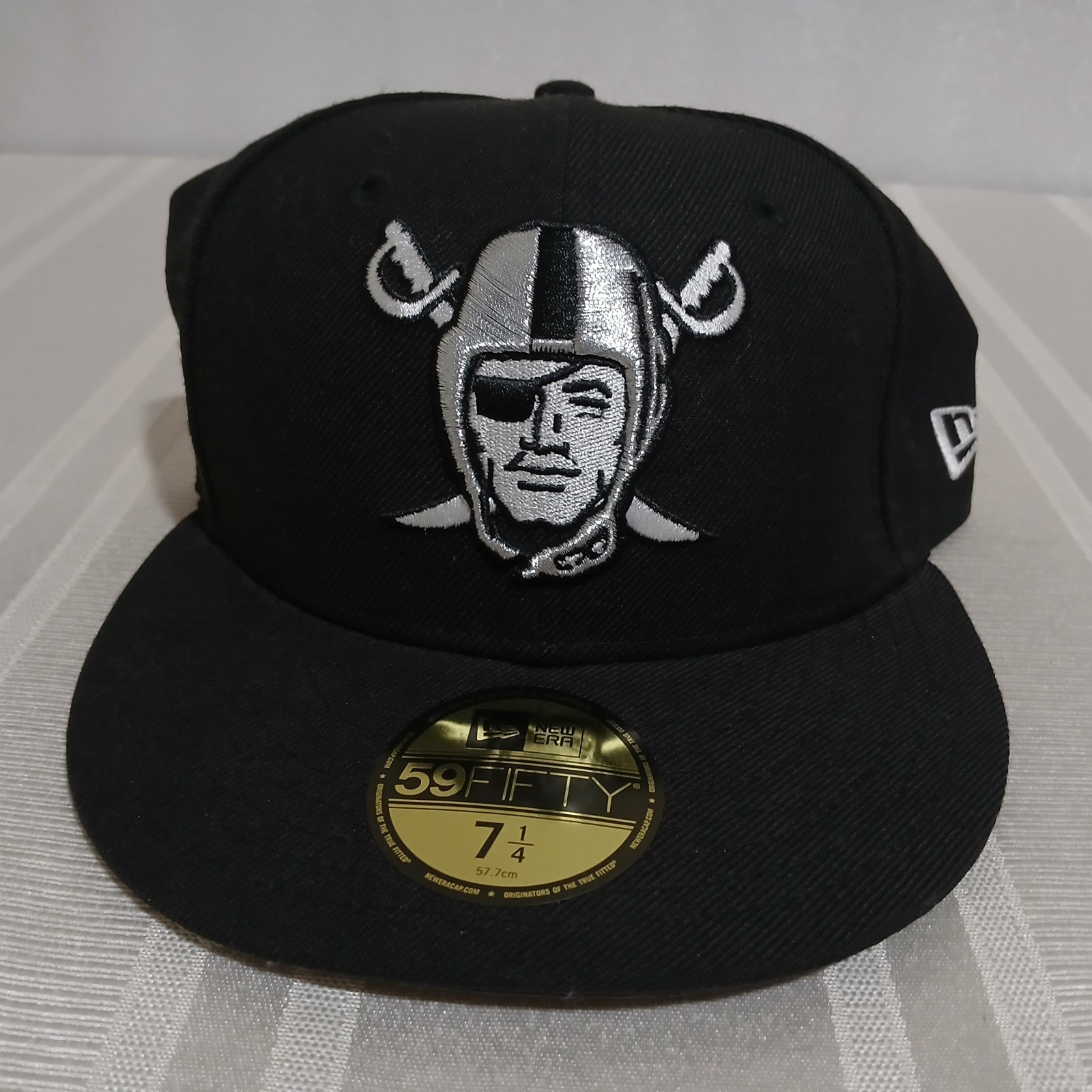 New Era Las Vegas Raiders Black Cap. Size 7 1/4. New With Tag.