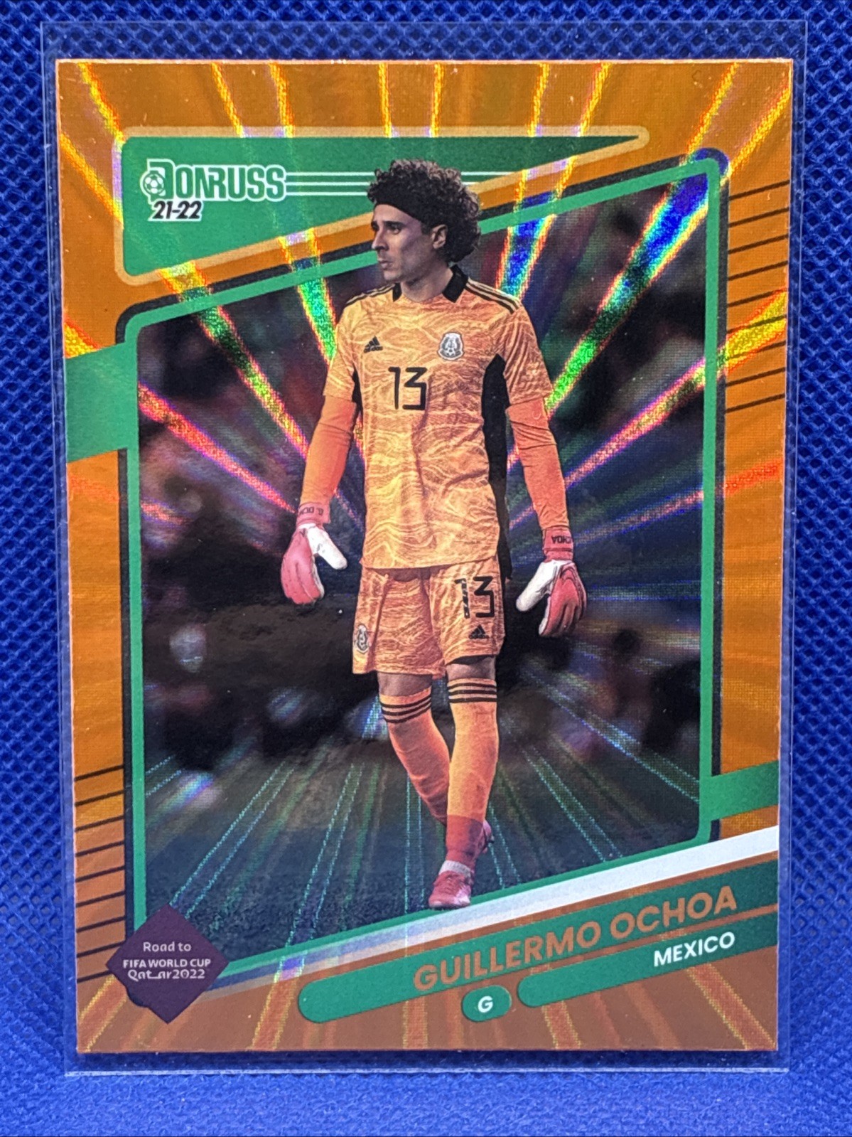 2021-22 Panini Donruss Road to Qatar – Guillermo Ochoa #85 Holo Orange Laser