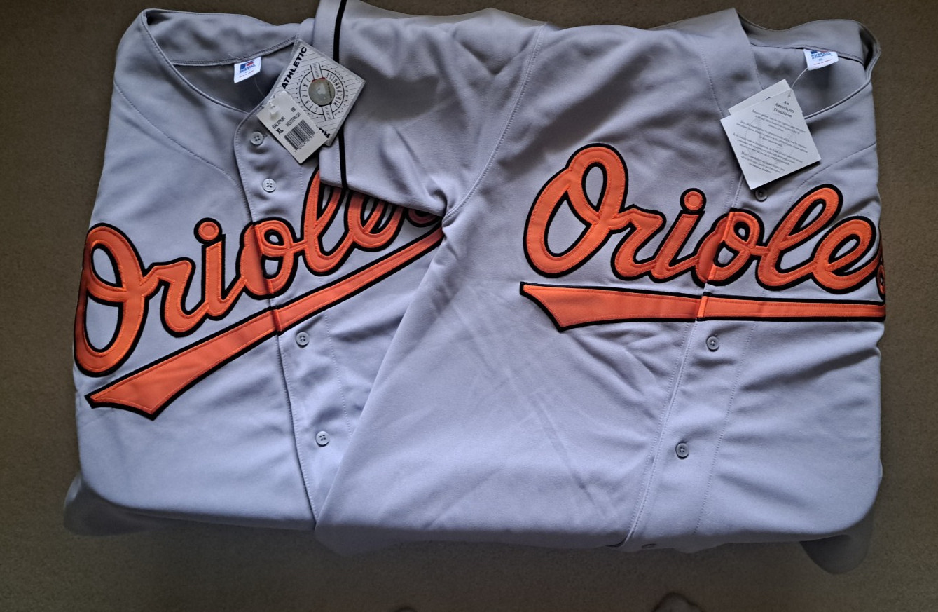 2 VINTAGE RUSSELL ATHLETIC ORIOLES JERSEYS XL NWT AND 2 #8 JERSEY NUMBERS