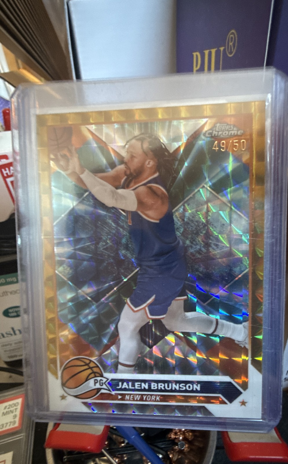 2023-24 Topps Chrome – Jalen Brunson #11 Gold Geometric Refractor /50