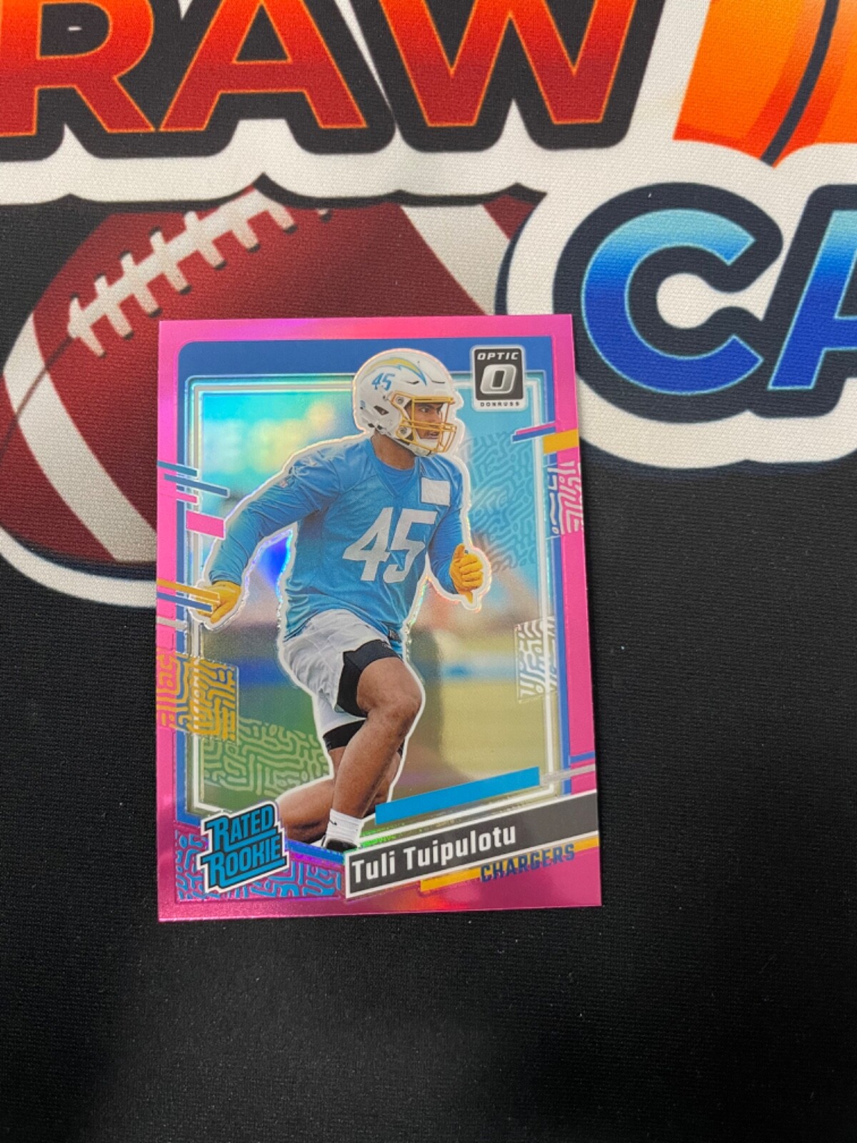 Donruss Football #354 Tuli Tuipulotu Optic Preview Pink Chargers Rated Rookie